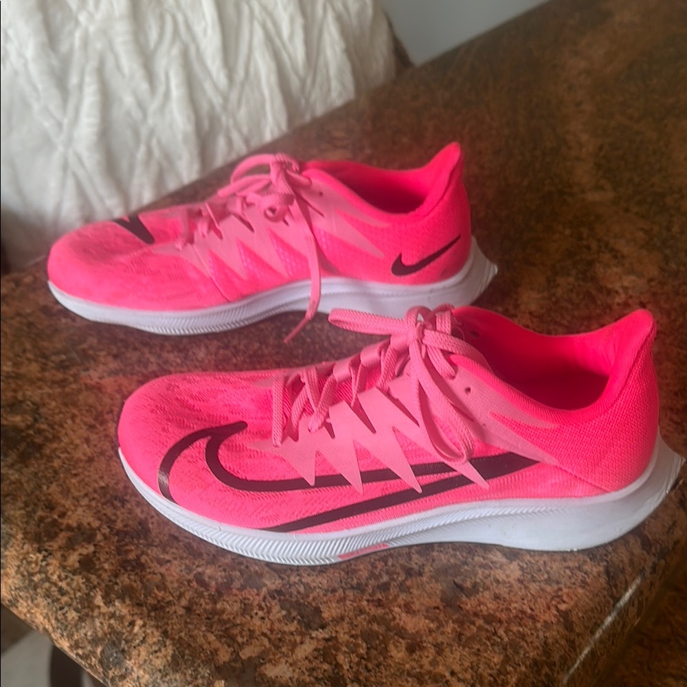 Nike Pink Athletic Shoes with Sleek Design
